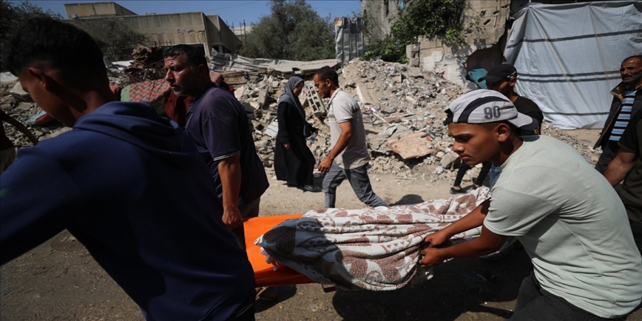 Katil israil, 57'si yardım bekleyen kişiler olmak üzere 80 Filistinliyi öldürdü