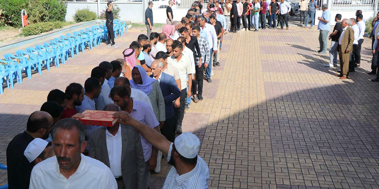 Husumetli aileler Kur'an'ın altından geçerek barıştı